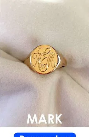 Monogram marked on a gold signet ring with an EST-FEP fiber laser